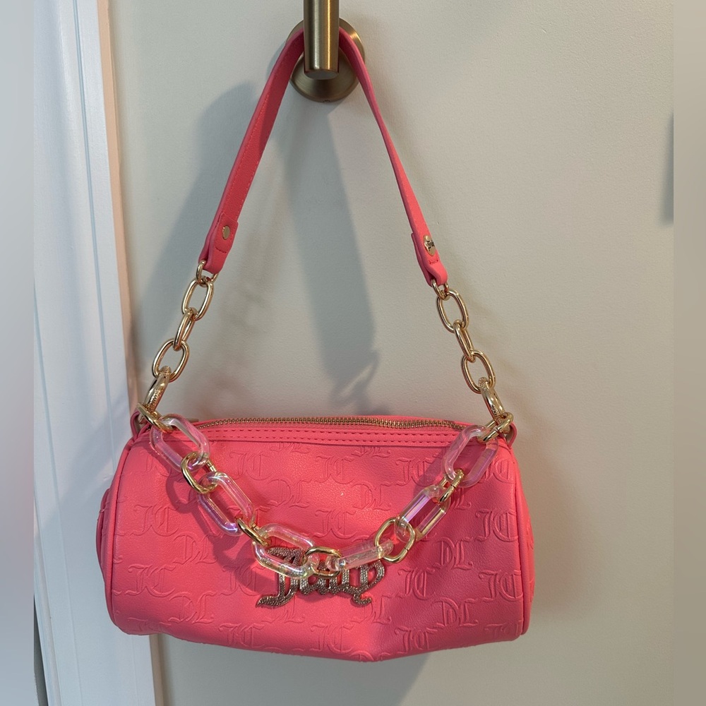 NWOT Juicy Couture Bling Bling Roll Bag Barrel in the color Pink Lemonade